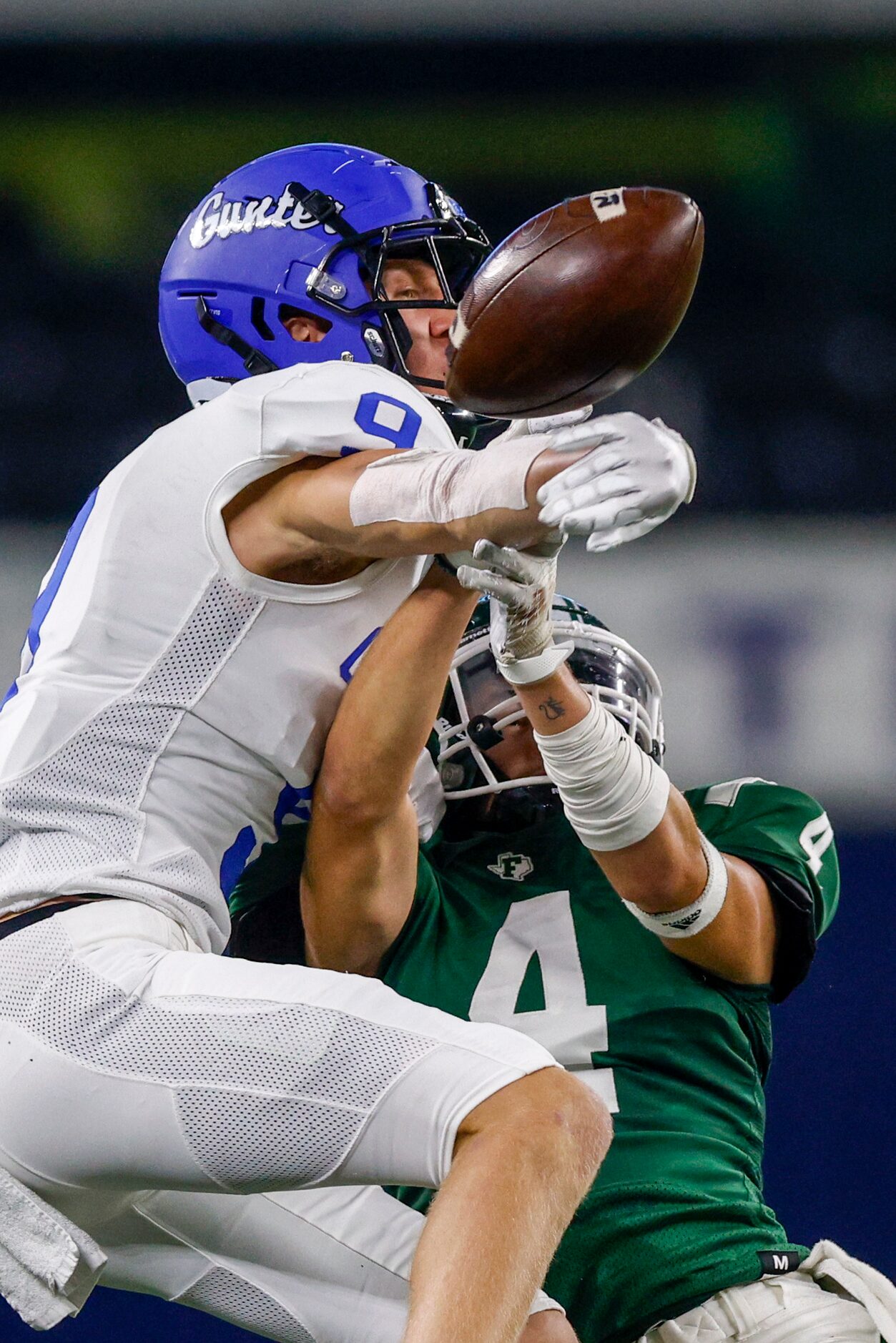 Gunter defensive back Cole Lemons (9) breaks up a pass intended for Franklin wide receiver...