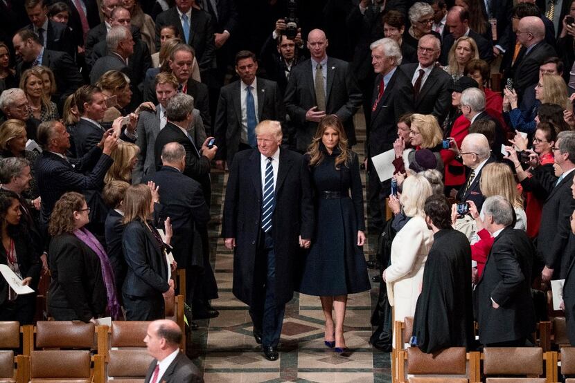 President Donald Trump and first lady Melania Trump arrive for a National Prayer Service on...
