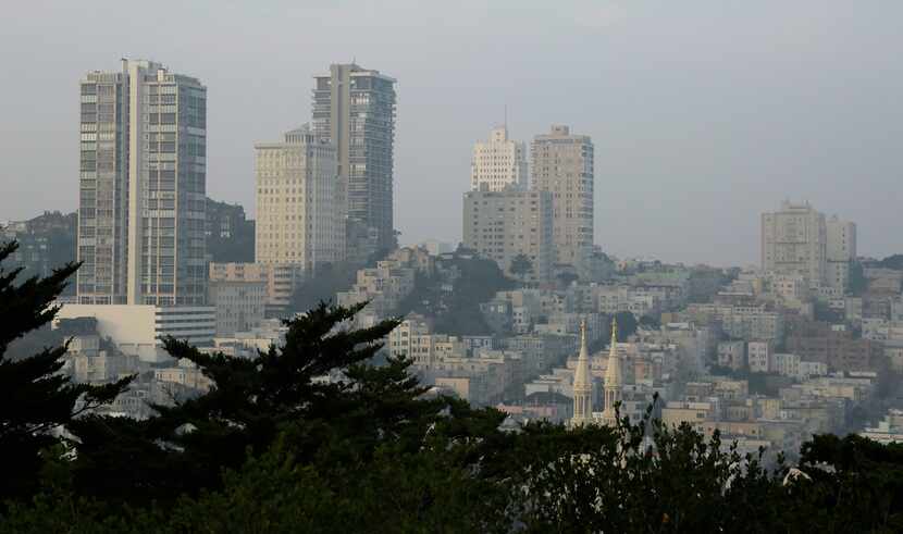Smoke and haze from the recent wildfires hovered over Russian Hill on Nov. 19 in San...