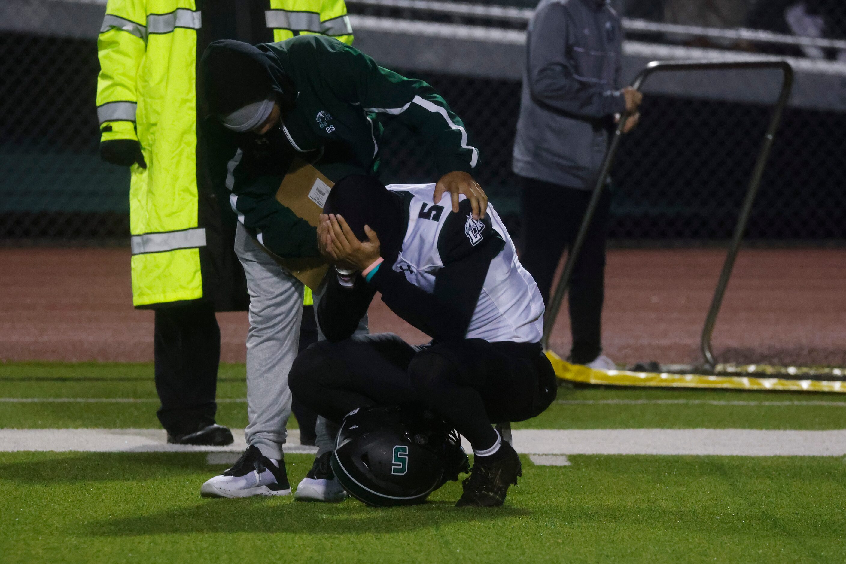 Mansfield Lakeridge High’s Michael Spencer (5) reacts to the defeat against Waxahachie High...