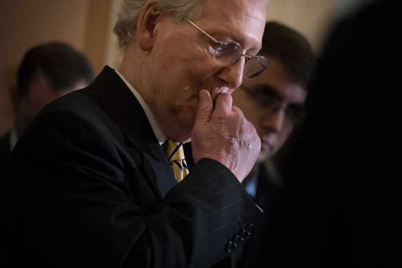 Senate Majority Leader Mitch McConnell of Kentucky attends a news conference on Capitol Hill...