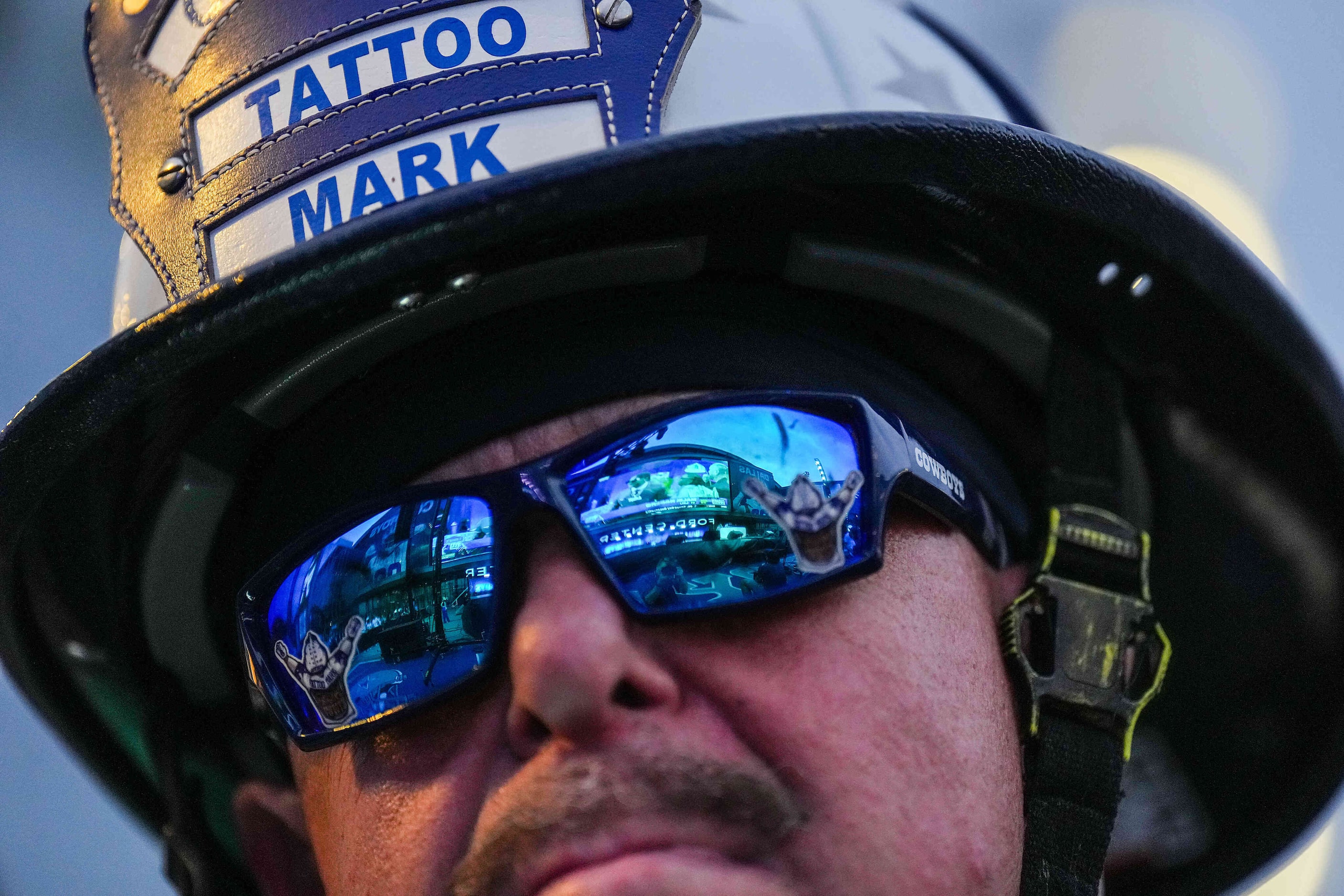 Dallas Cowboys fan Mark “Tattoo Mark” Shenefield watches the first round of the NFL Draft...