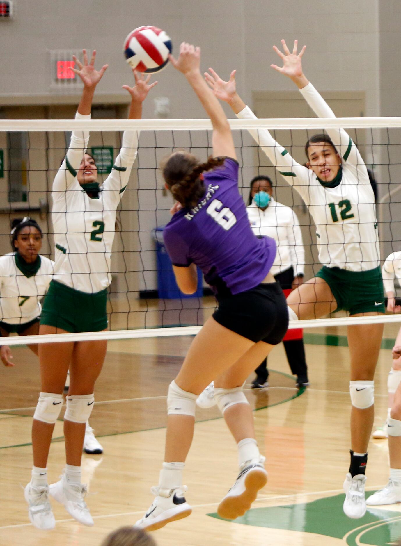 Frisco Independence outside hitter Reagan Bedell (6) attempts to squeeze a shot past the...