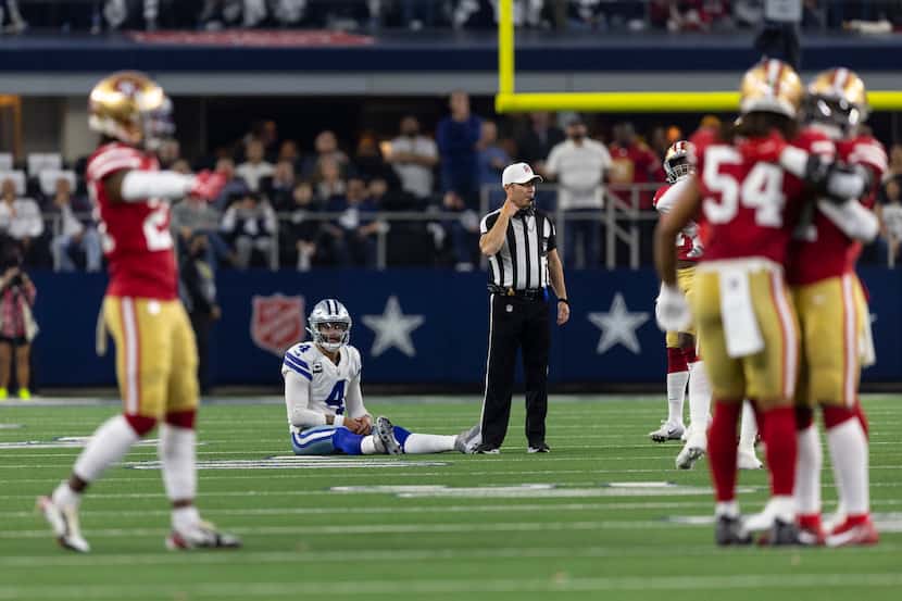 Dallas Cowboys quarterback Dak Prescott (4) looks on after throwing an incomplete pass,...