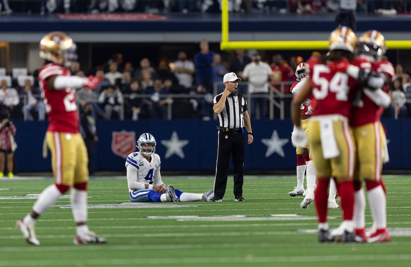 Dallas Cowboys quarterback Dak Prescott (4) looks on after throwing an incomplete pass,...