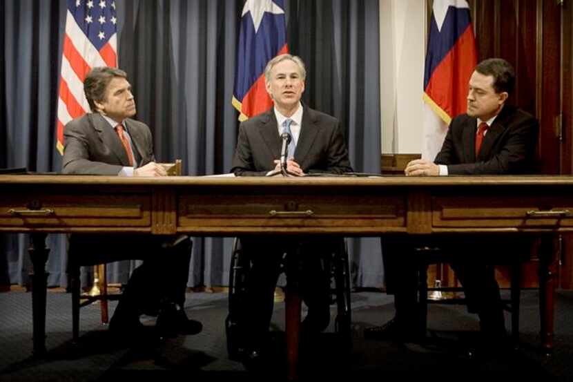 
Gov. Rick Perry, Attorney General Greg Abbott and Agriculture Commissioner Todd Staples...