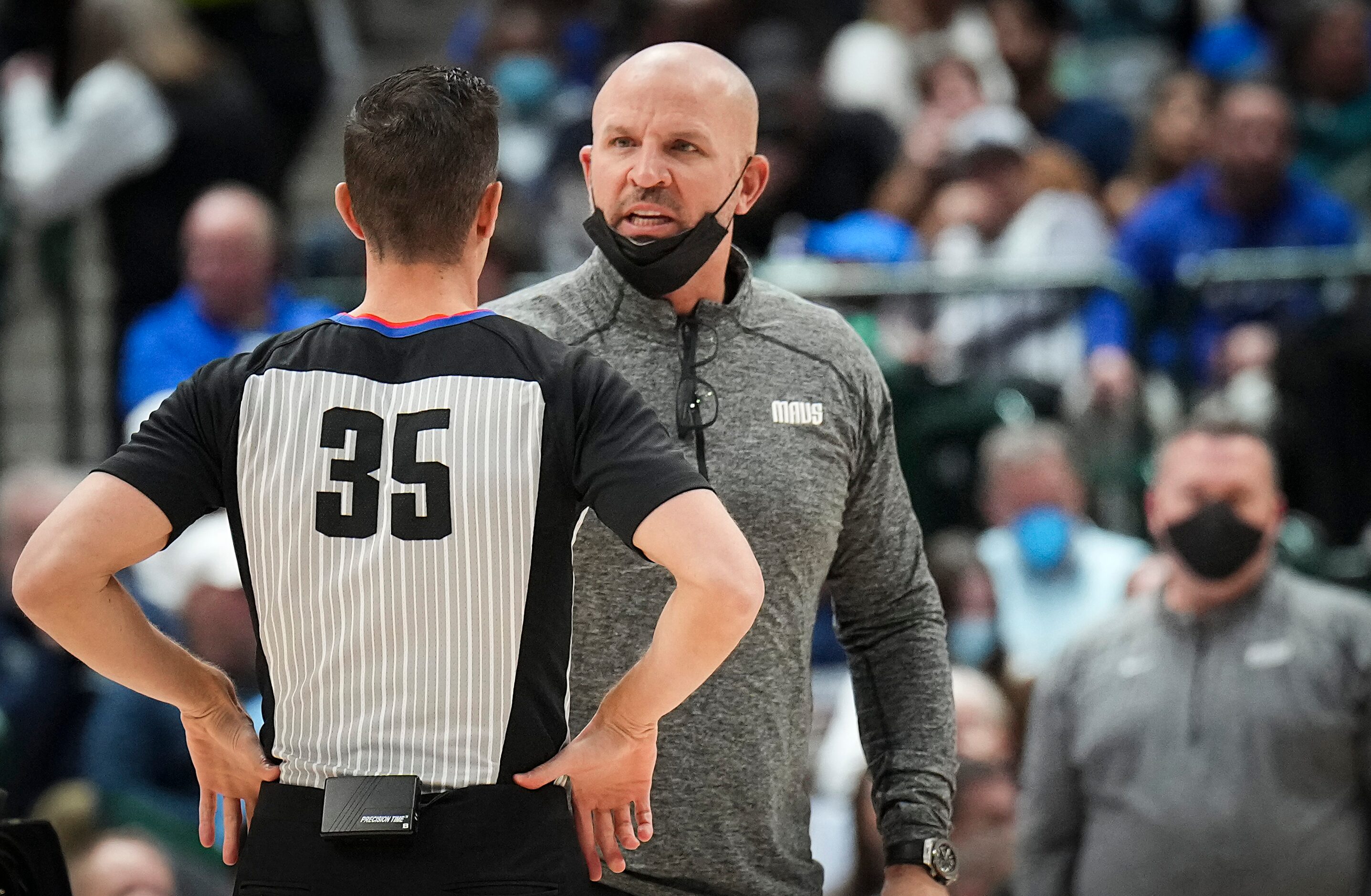 Dallas Mavericks coach Jason Kidd looks for a call from referee Jason Goldenberg during the...