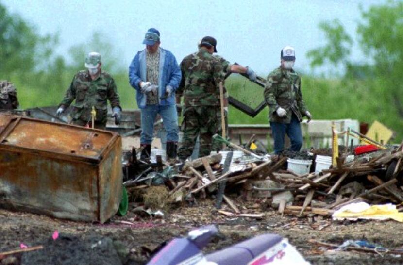 Workers continued to sift through the burned Branch Davidian compound on April 29, 10 days...