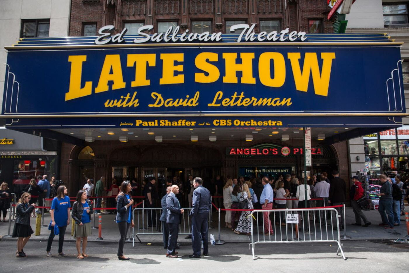 Fans of David Letterman, members of the media, security agents, passersby and employees of...