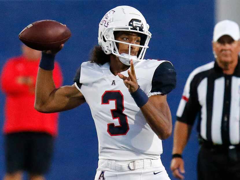 Allen High School quarterback Mike Hawkins (3) throws a pass during the first half as...
