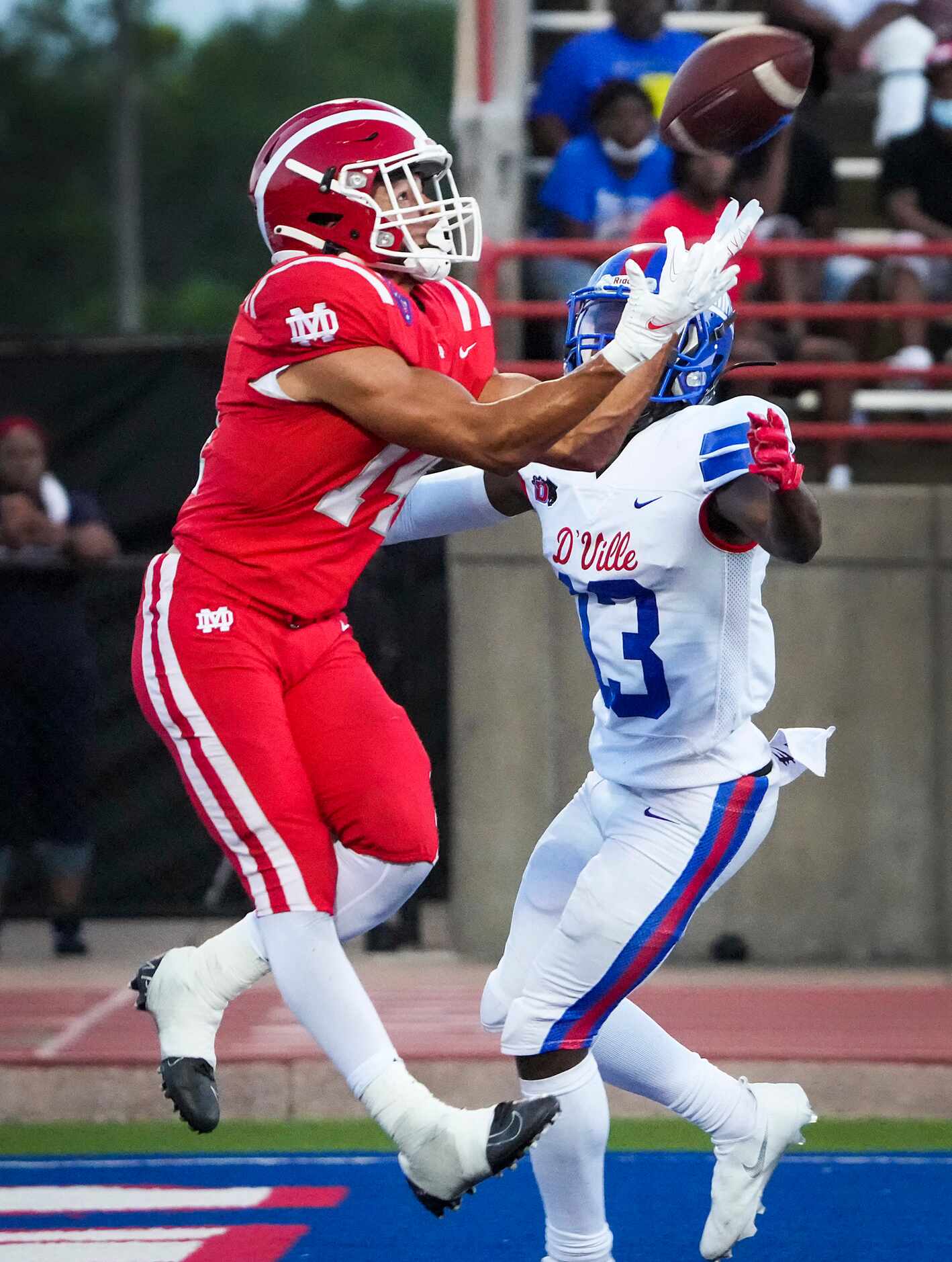 Mater Dei defensive back Joshua Hunter (14) intercepts a pass in the end zone intended for...