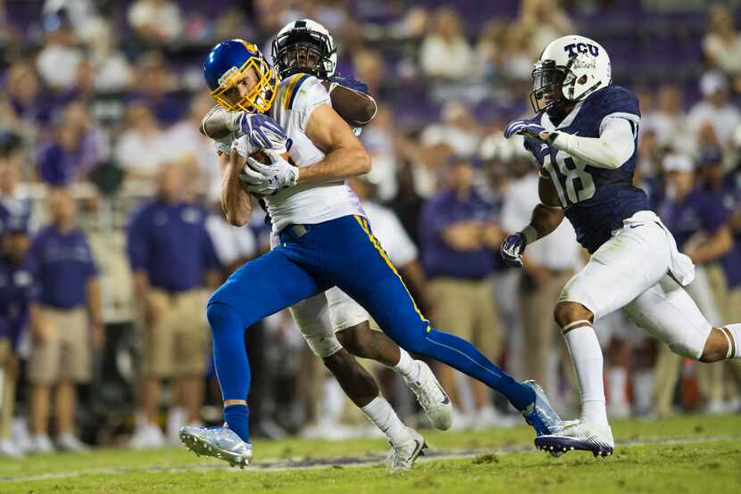 FORT WORTH, TX - SEPTEMBER 3, 2016:  Jake Wieneke of South Dakota State is brought down by...