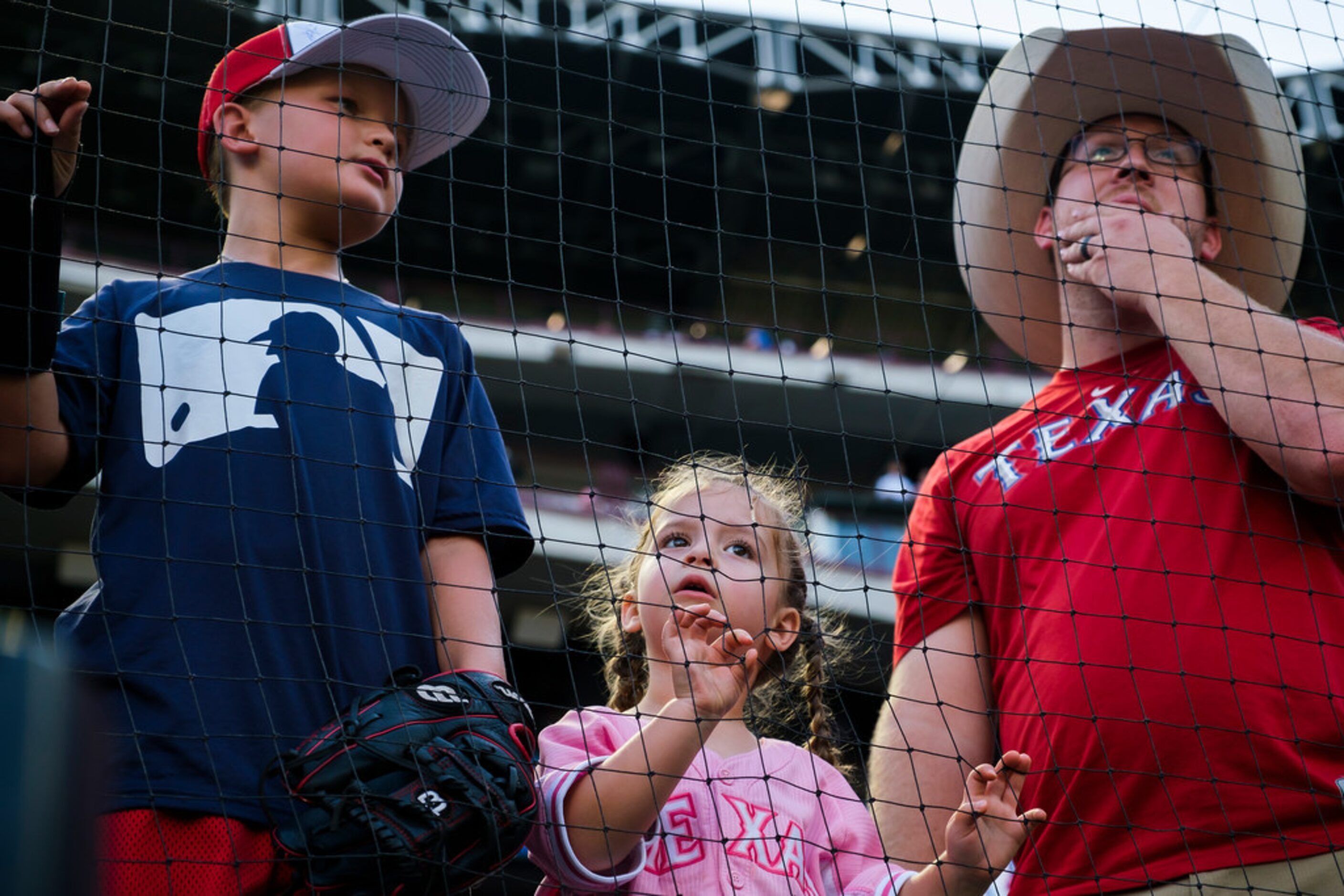 Fans look for an autograph before a game between the Texas Rangers and the Seattle Mariners...