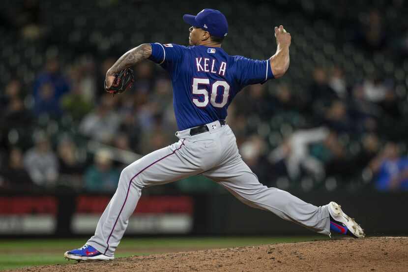 SEATTLE, WA - MAY 30: Reliever Keone Kela #50 of the Texas Rangers delivers a pitch during...