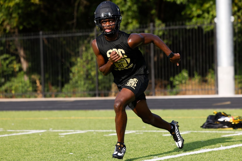 Linebacker Brandon Jones runs a drill during South Oak Cliff’s first day of football...