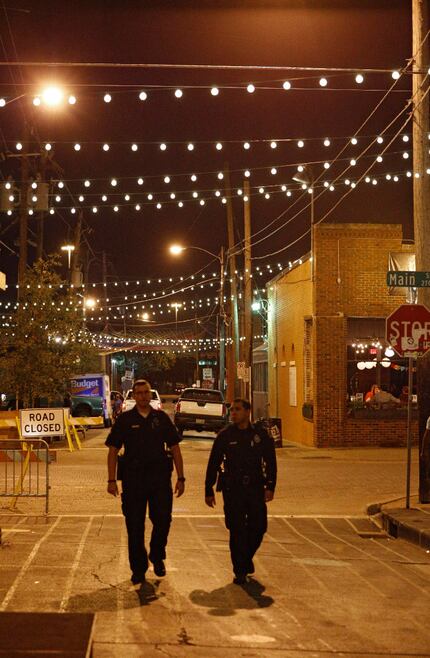 Police who were working a private event in Deep Ellum walk the streets in Dallas, TX Sept....