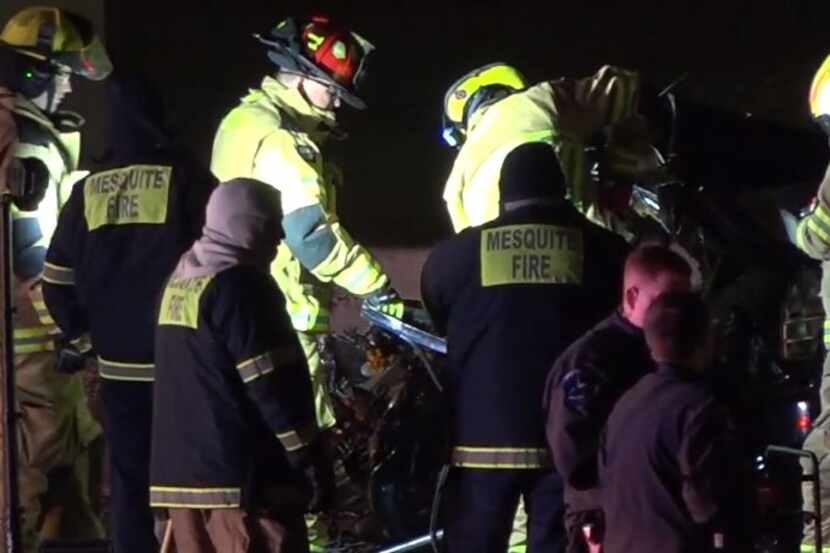 Mesquite firefighters and police work the scene of a wrong-way crash that killed two people...