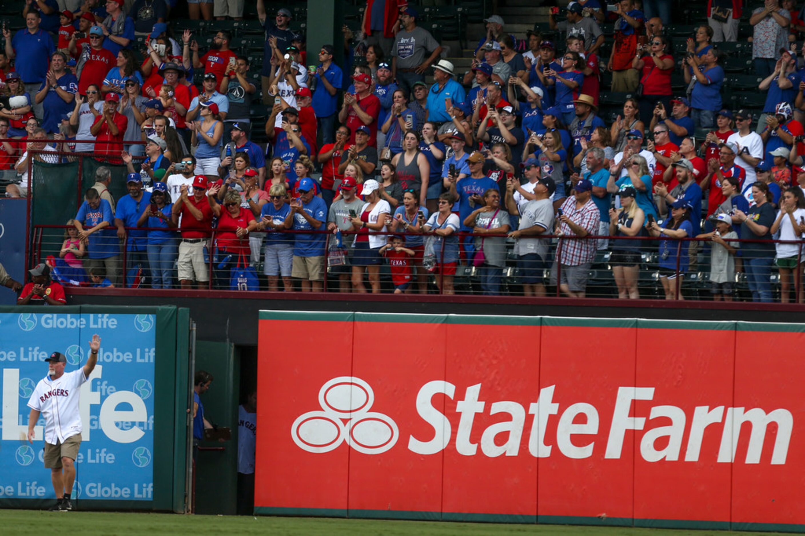 Former Texas Rangers outfielder Rusty Greer is recognized as a member of the  Globe Life...