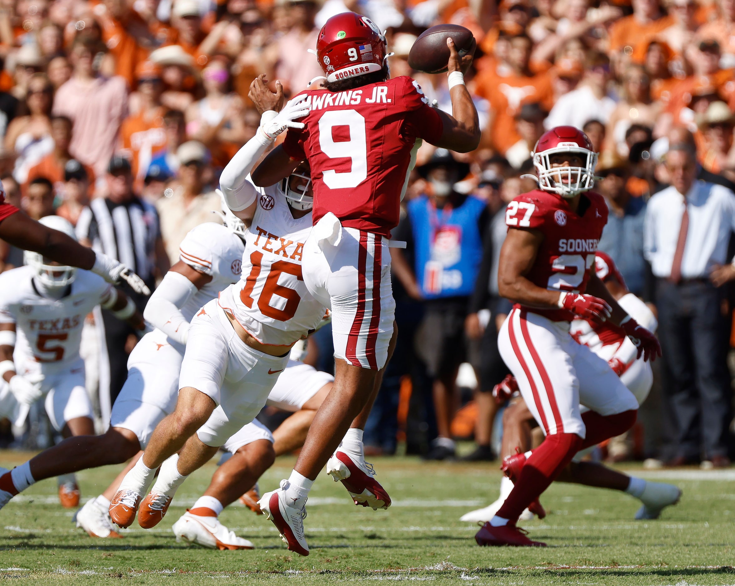 Texas Longhorns defensive back Michael Taaffe (16) sacks Oklahoma Sooners quarterback...