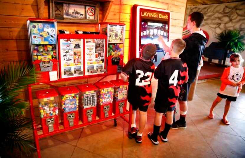 
Kids have fun playing with the digital jukebox at Pit Stop BBQ.

