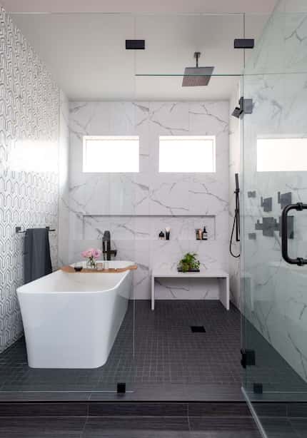 According to Steidley Studio, a hot trend in shower design is a "wet room," an enclosed tub...
