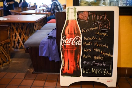 "We'll miss you!" says a sign inside Luna's.