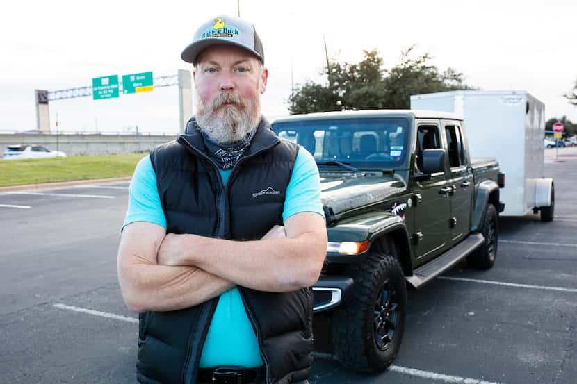 Andrew Hoeft, posing beside a toll road he has to take regularly, is the owner and operator...