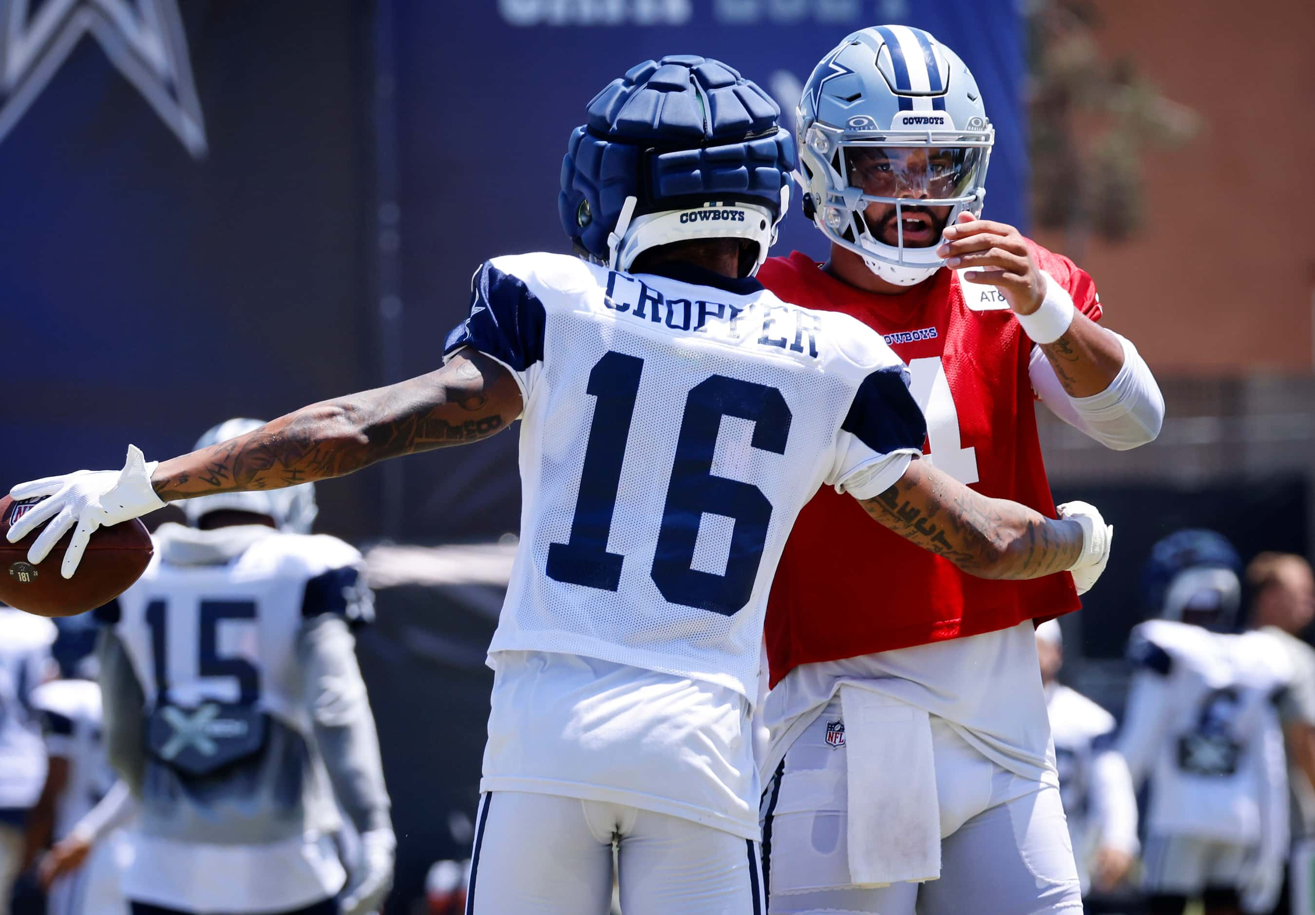 Dallas Cowboys quarterback Dak Prescott (4) and wide receiver Jalen Moreno-Cropper (16)...