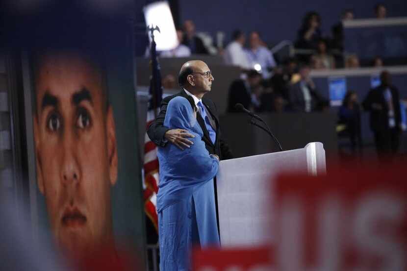 Khizr Khan, father of fallen soldier Humayun S. M. Khan, pauses while speaking during the...