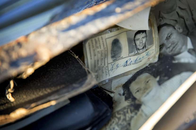 A leather valise  with old photographs and an ID card remained unclaimed at GT Storage in...