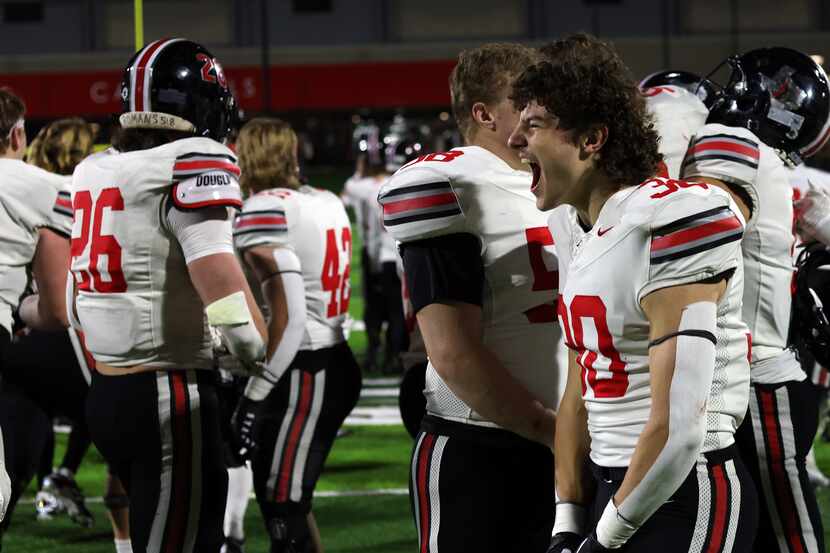 Lucas Lovejoy linebacker Wes Hightower (30), right, lets out a yell as he celebrates with...