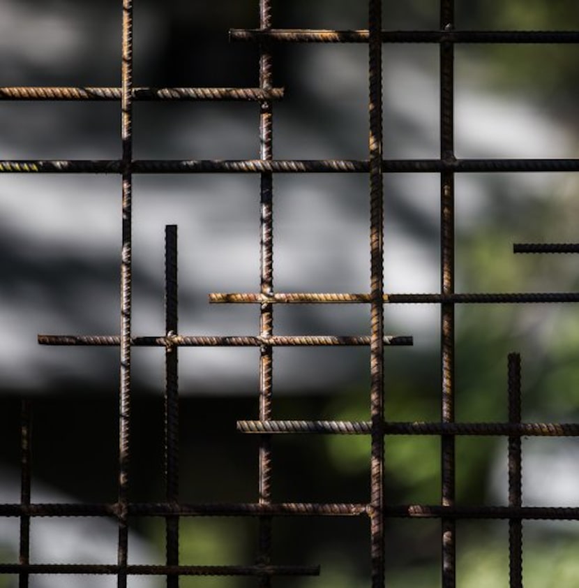 
An iron gate at the front of the Boyd-Lloyds’ home

