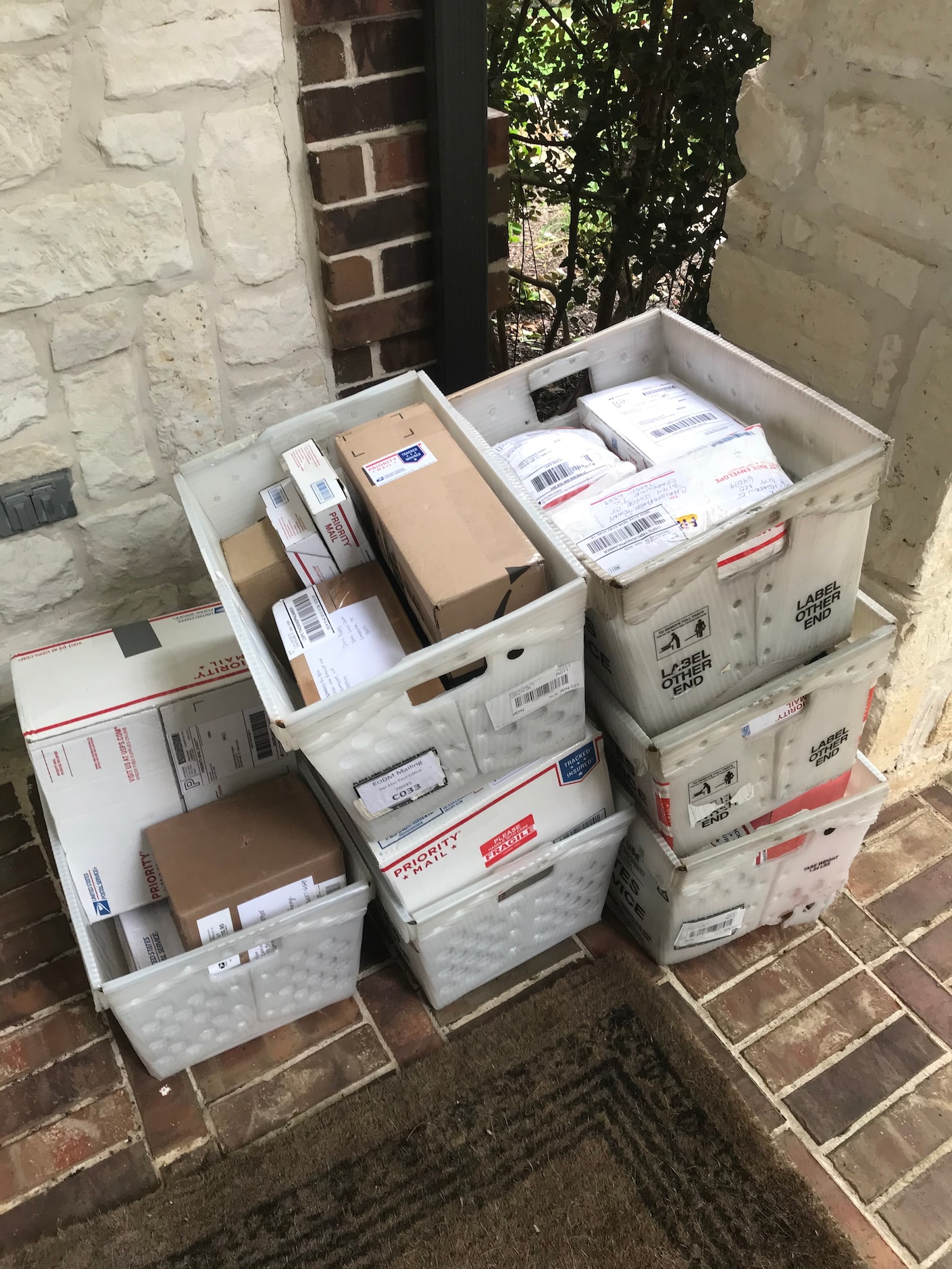 Chris Penny's porch in Grapevine, TX was stacked with boxes of painted rocks at the height...