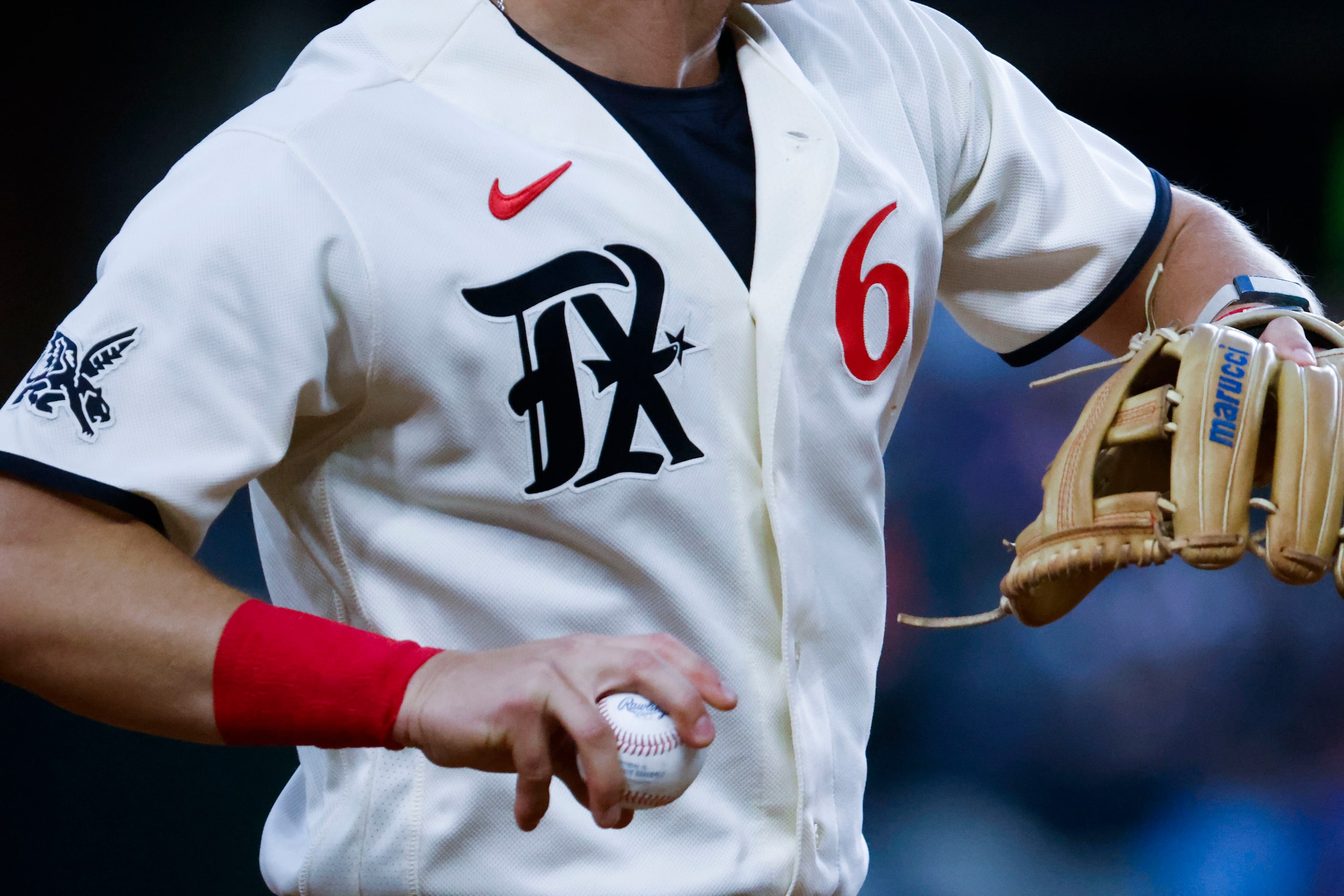 Texas Rangers third baseman Josh Jung wearing the city connect jersey during the eighth...