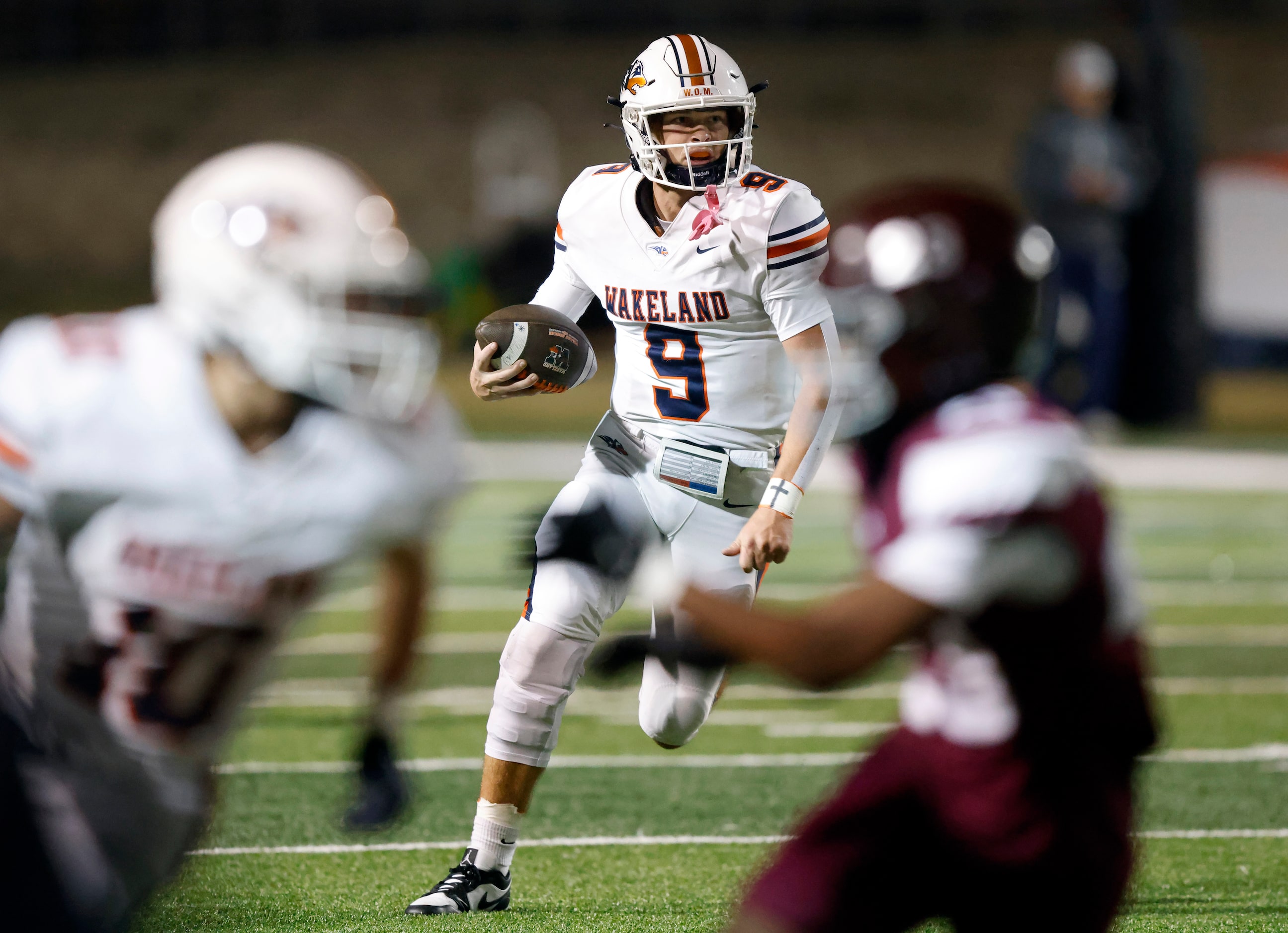 Frisco Wakeland quarterback Brennan Myer (9) runs with the ball in the third quarter of...