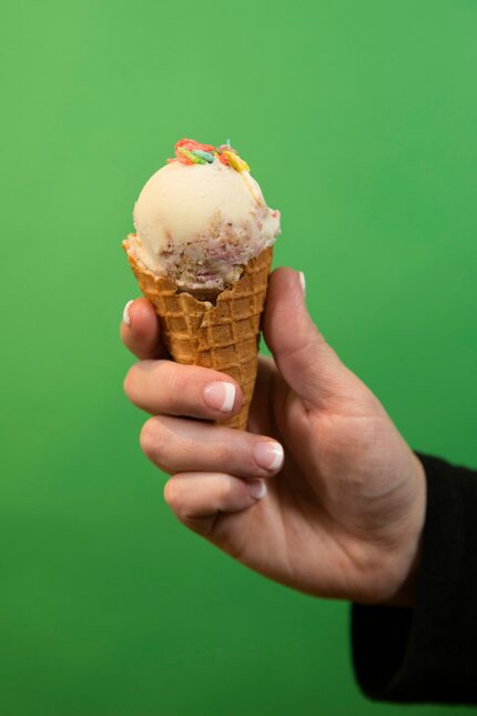 A cranberry cheesecake with Fruity Pebbles topping ice cream cone at Baldo's on Hillcrest...