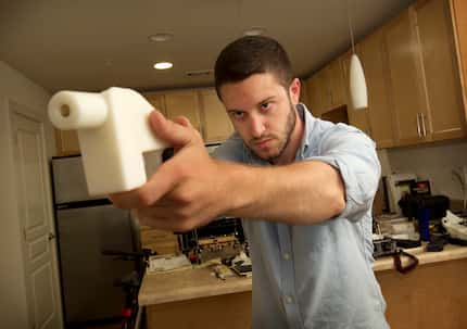 Cody Wilson showed the first completely 3D-printed handgun, The Liberator, at his home in...