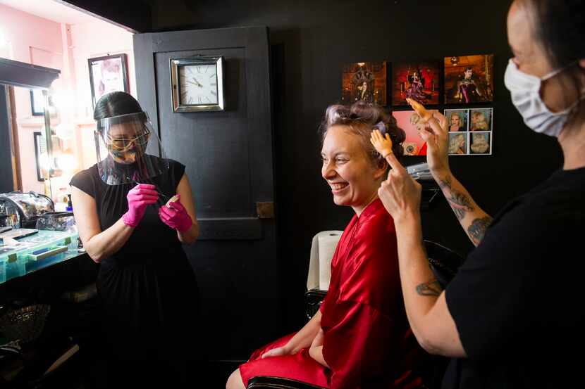LaDonna Stein (left), proprietor of Dallas Pin Up, prepared to do Jessica Lee's makeup as...