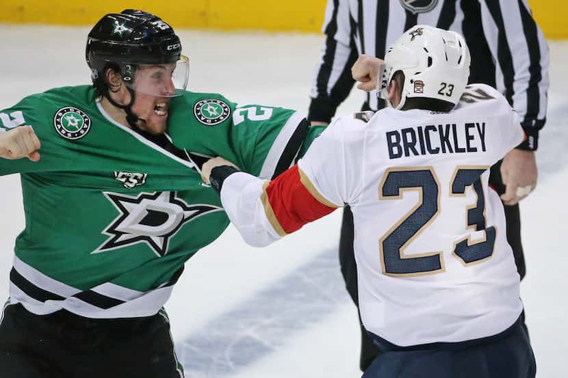 Dallas Stars right wing Brett Ritchie (25) fights with Florida Panthers center Connor...