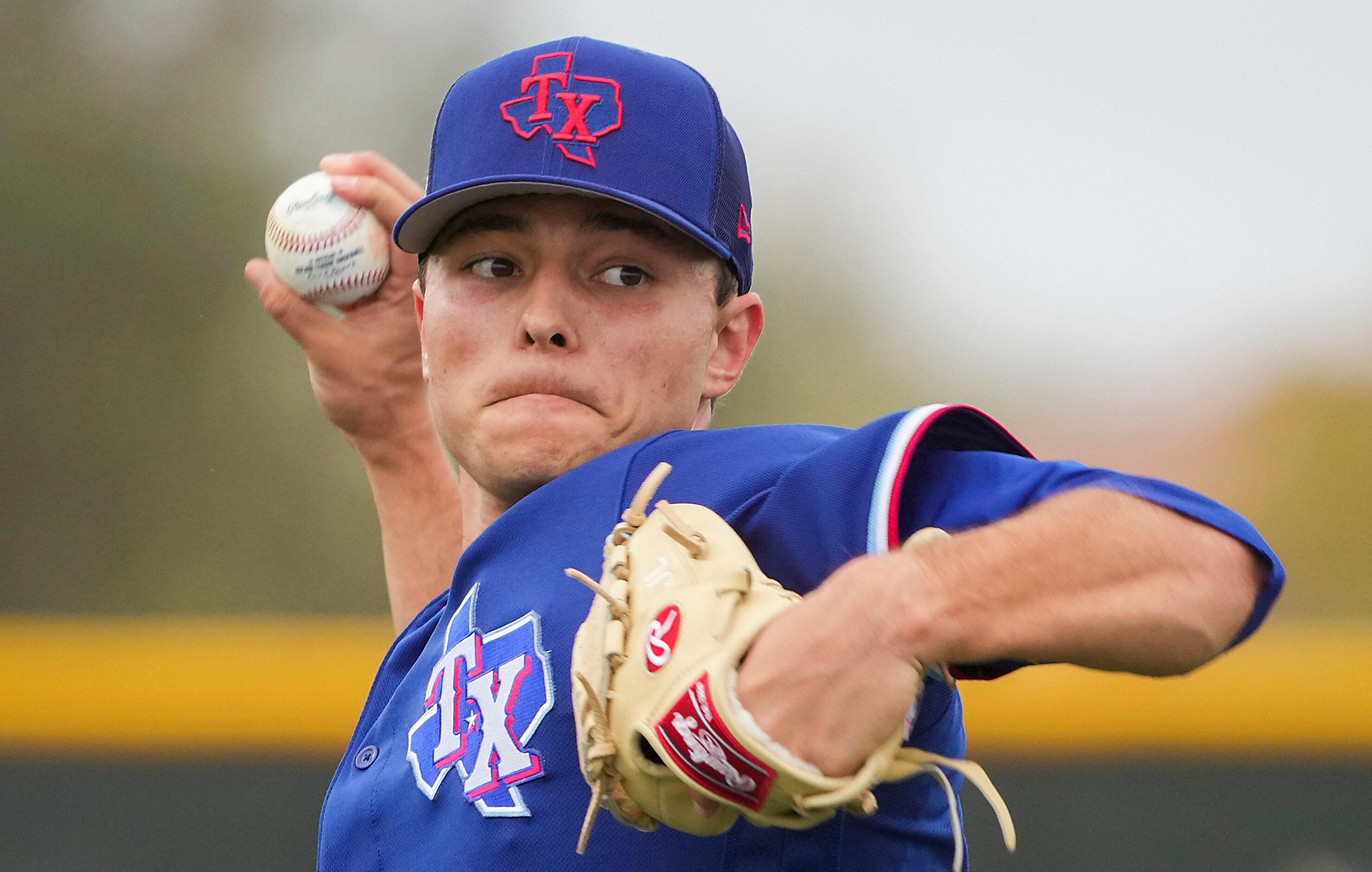 Texas Rangers pitcher Jack Leiter warms up before throwing a bullpen session a during a...