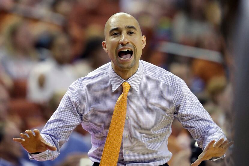 FILE - In this Tuesday, Dec. 27, 2016 file photo, Texas coach Shaka Smart calls to his...