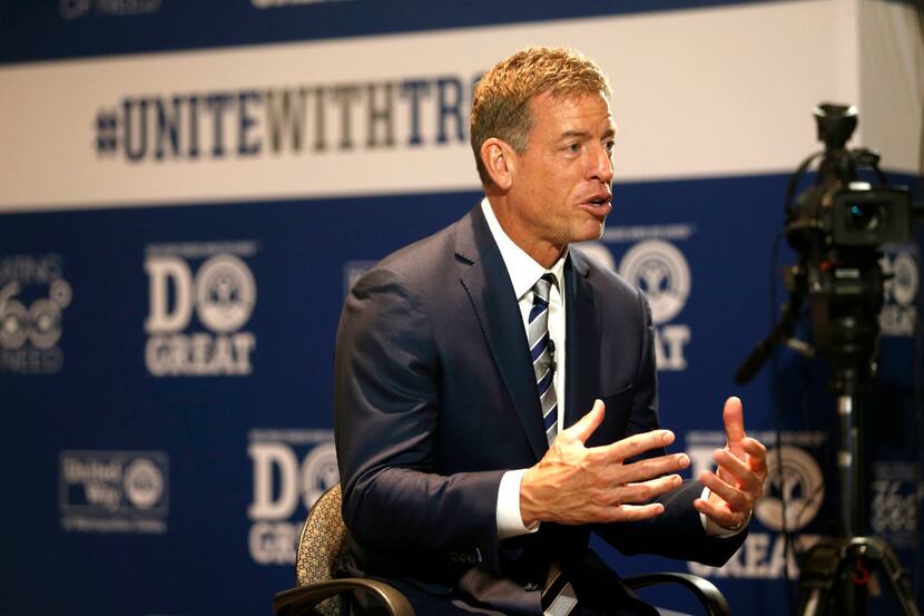 Former Dallas Cowboy quarterback Troy Aikman speaks during a media interview at  United Way...