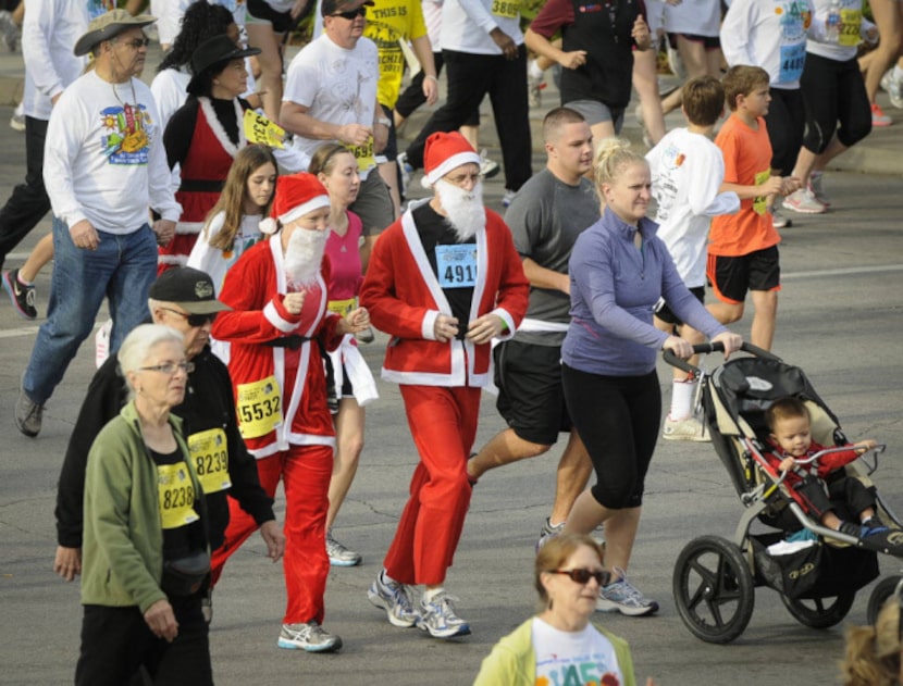 
Many of the participants in the YMCA Turkey Trot wore costumes commemorating the season,...