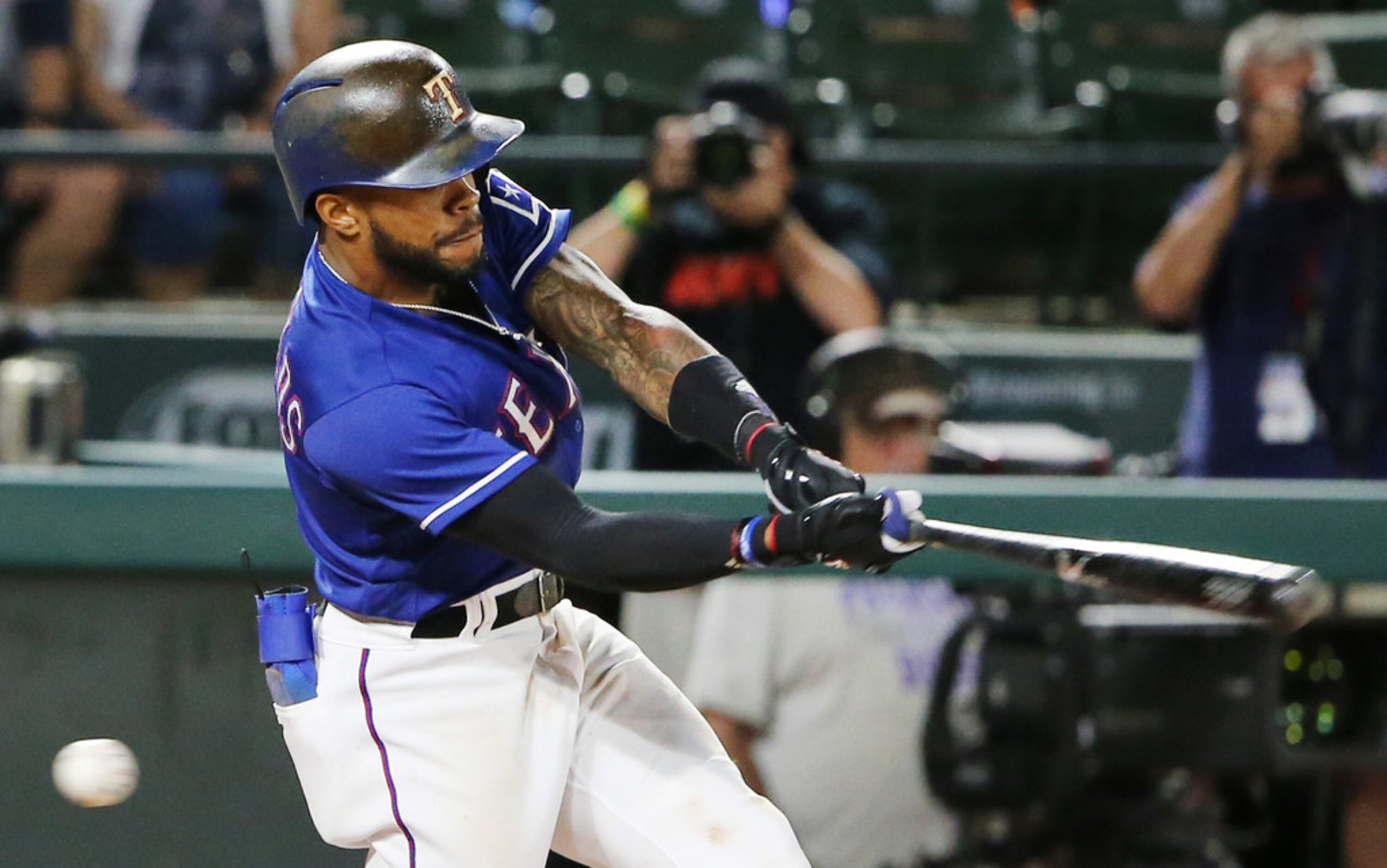 Texas Rangers centerfielder Delino DeShields (3) strikes out to end the game while stranding...