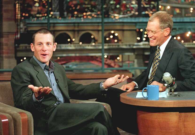 Lance Armstrong, left, winner of the 1999 Tour de France, appears on The Late Show with...