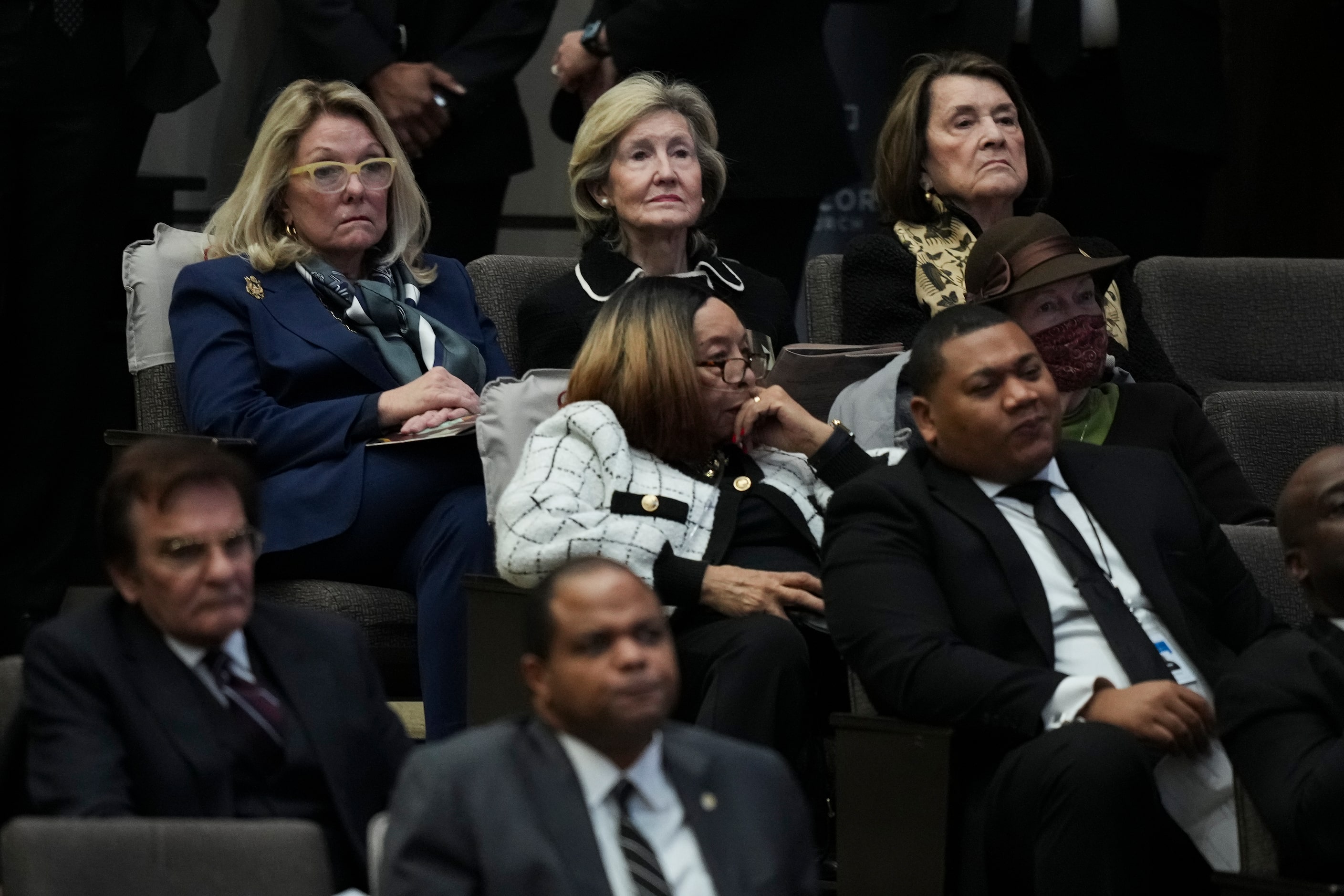 Former Sen. Kay Bailey Hutchison (top center) listens to a speaker during funeral services...