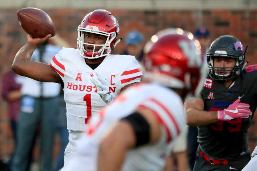 DALLAS, TX - OCTOBER 22:  Greg Ward Jr. #1 of the Houston Cougars looks for an open receiver...