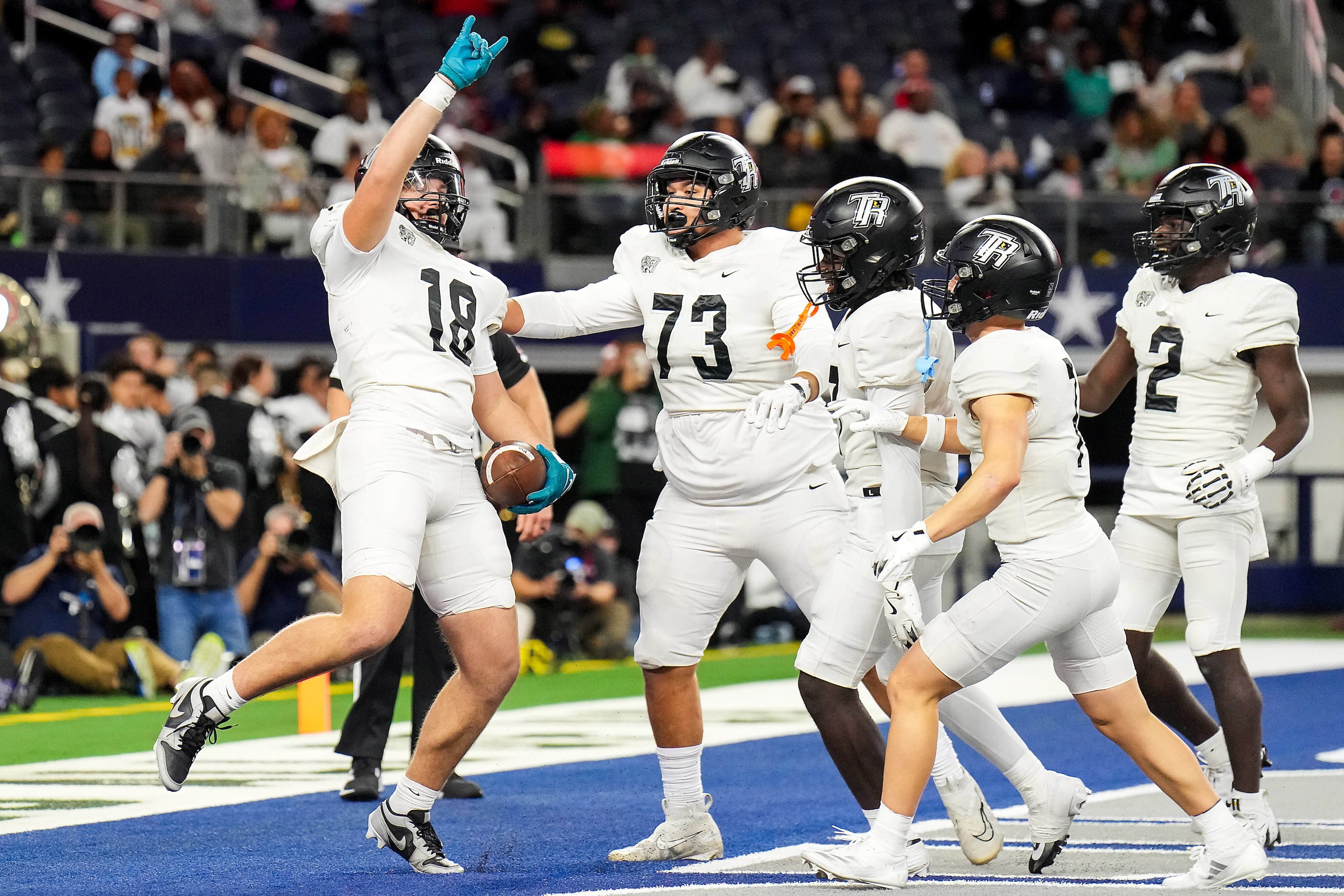 Richmond Randle tight end Mason Mixon (18) celebrates after scoring on a touchdown reception...