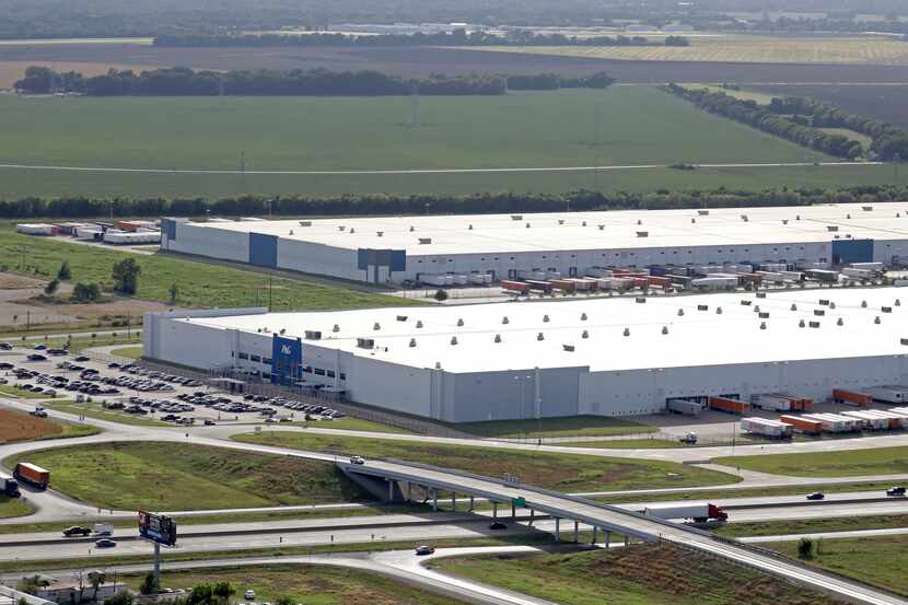 The Procter & Gamble distribution center, front, and the Whirlpool shipping hub, behind,...