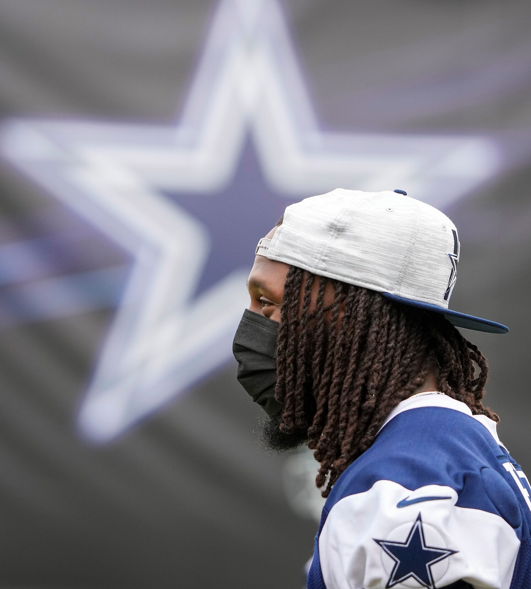 Newly signed Dallas Cowboys safety Malik Hooker watches from the sidelines during a practice...